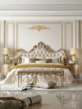 Ornate French Provincial style luxury tufted bed in gold bedroom - GrandLiving Luxe
