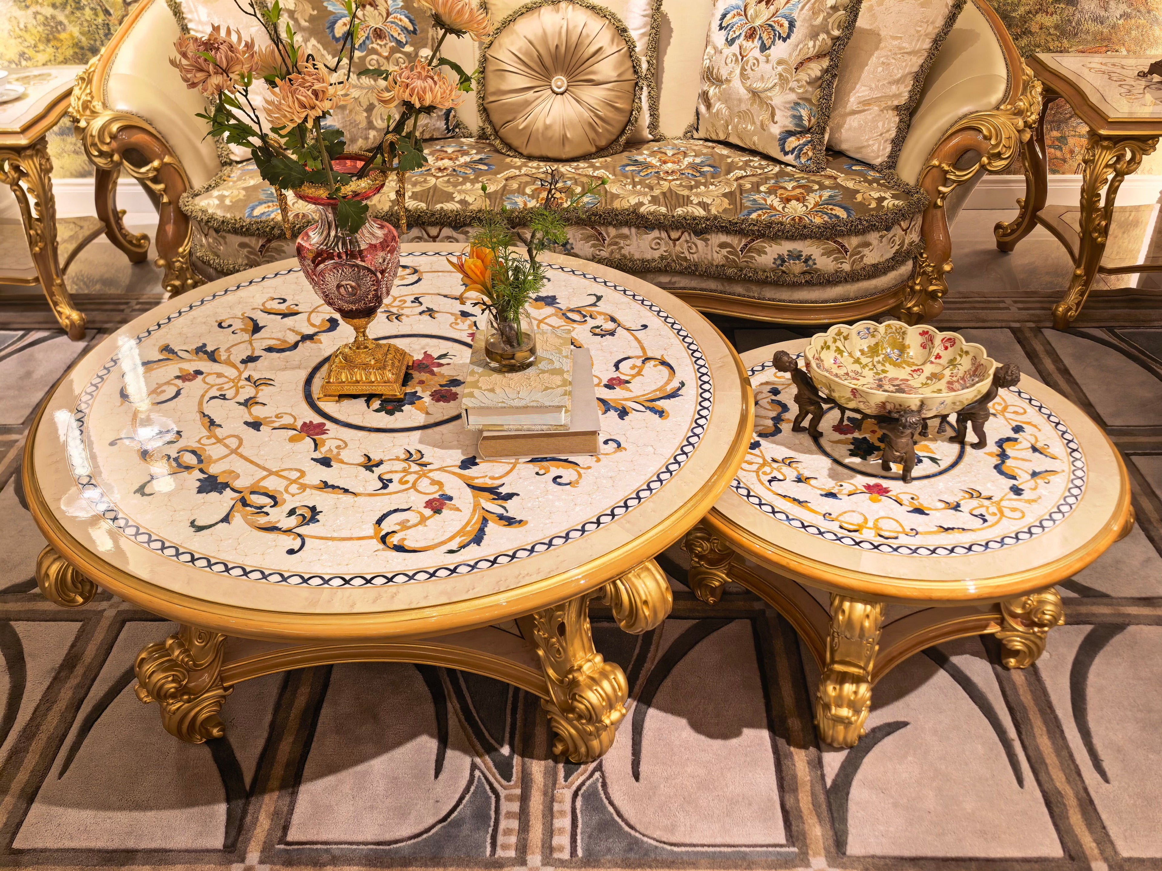 Antoinette French Imperial coffee table hand-carved gold gilt leg detail - GrandLiving Luxe