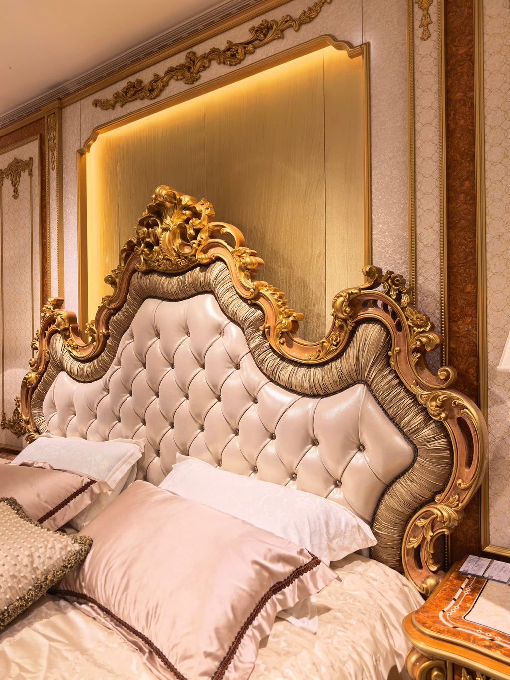 Vivienne French Imperial bed headboard detail, hand-carved gold gilt finish - GrandLiving Luxe