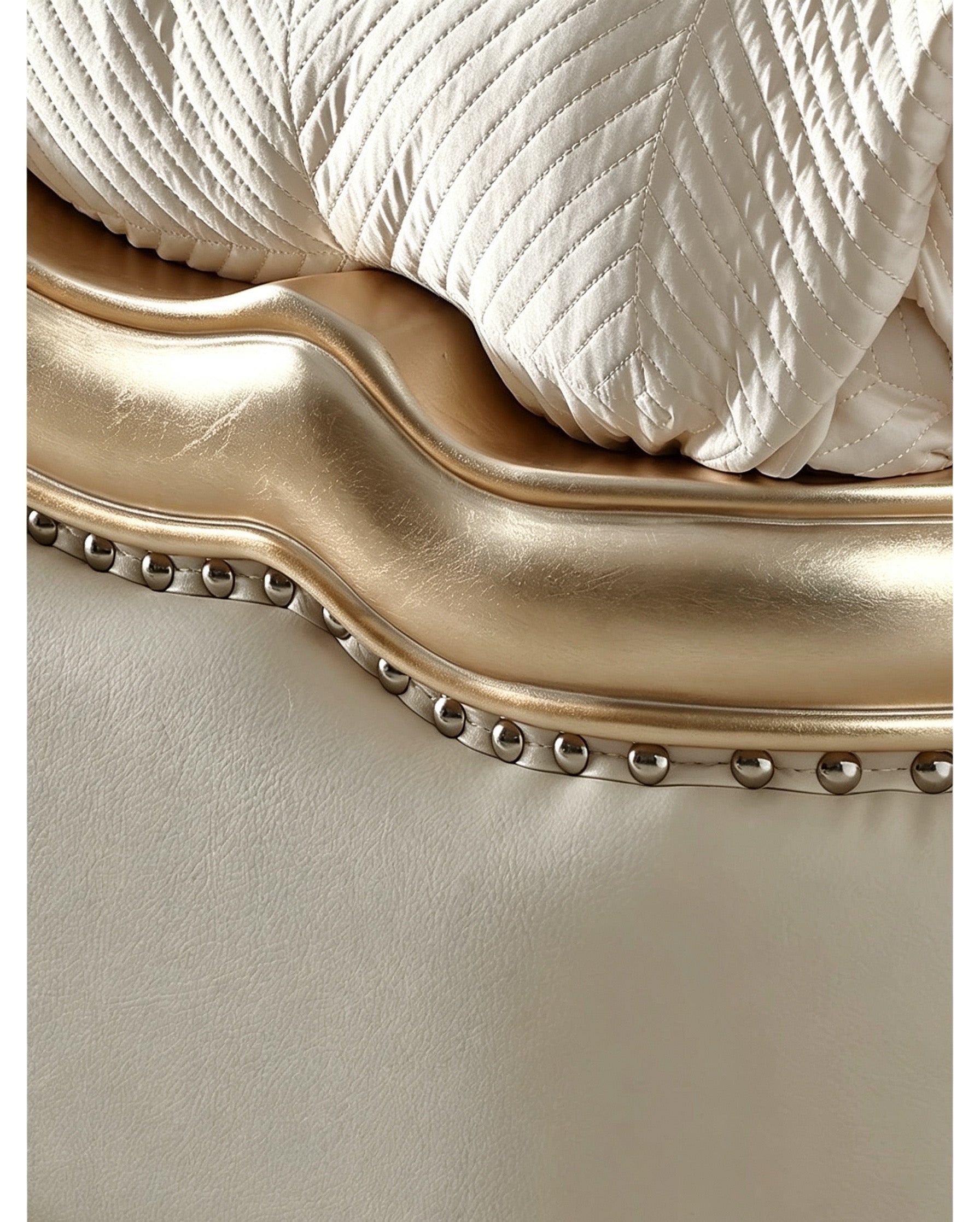 Ornate French Provincial style luxury tufted bed in gold bedroom - GrandLiving Luxe
